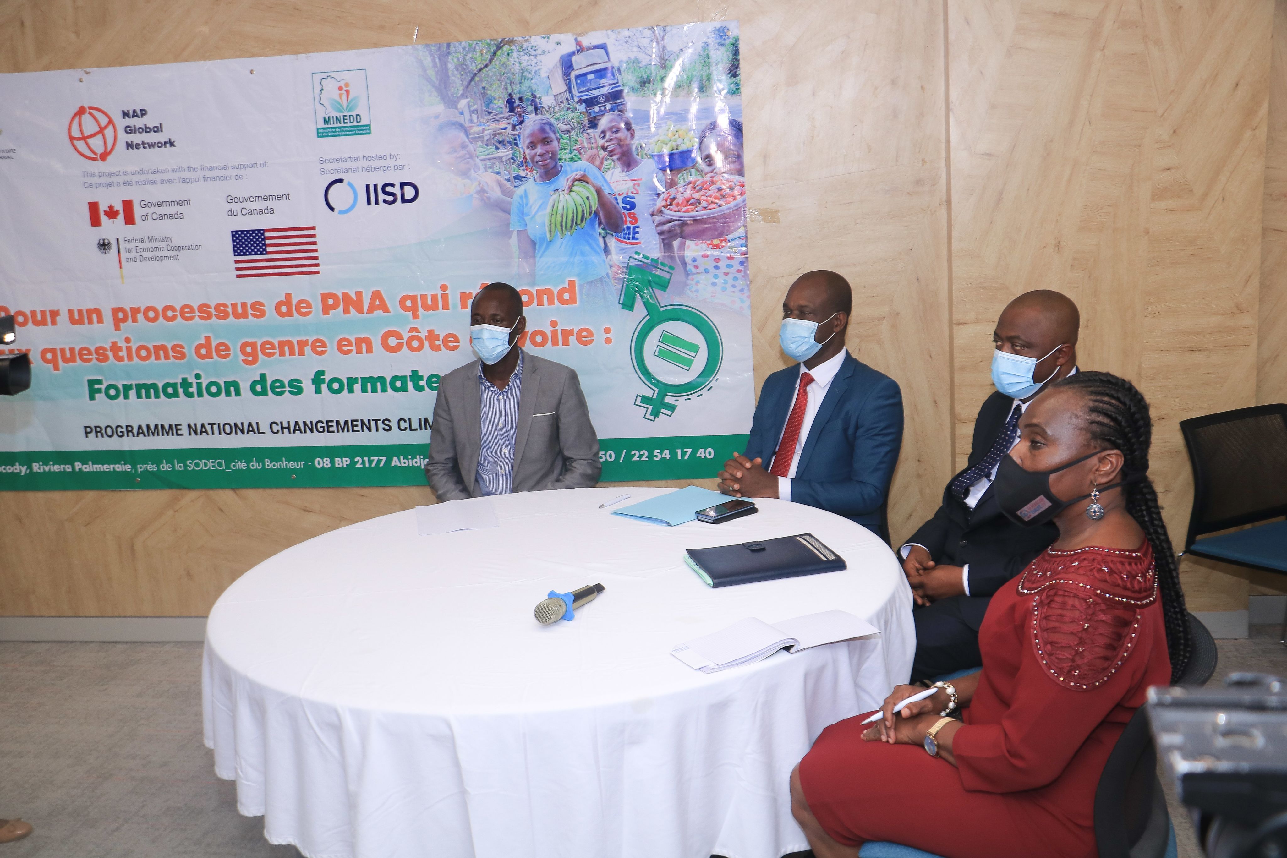 Participants of an event in June 2021 to combine Côte d'Ivoire's government efforts toward gender equality and climate change adaptation.